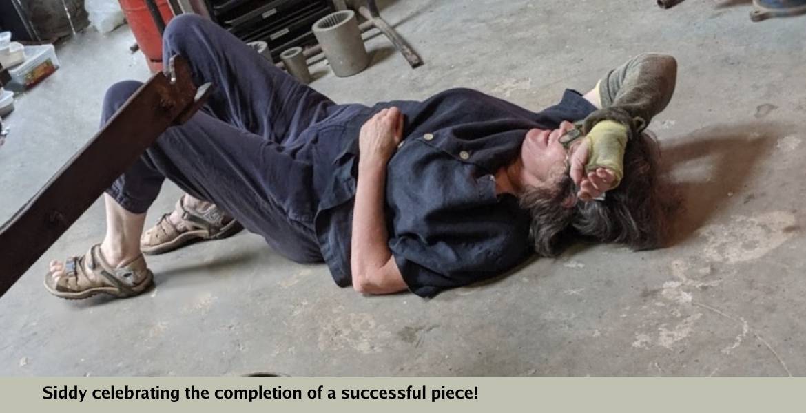 Siddy looking exhausted, celebrating the completion of a successful piece!